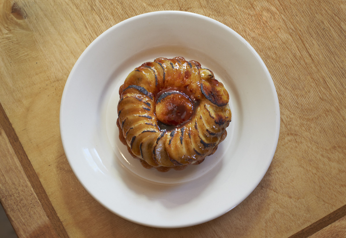 An apple tart on a white plate